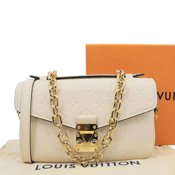 Louis Vuitton  Metis East West Pochette Empreinte Leather Crossbody Bag Cream - Picture 3 of 15